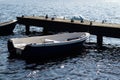 Beautiful marina on the lake. Warm autumn day, wooden bridge, bo Royalty Free Stock Photo